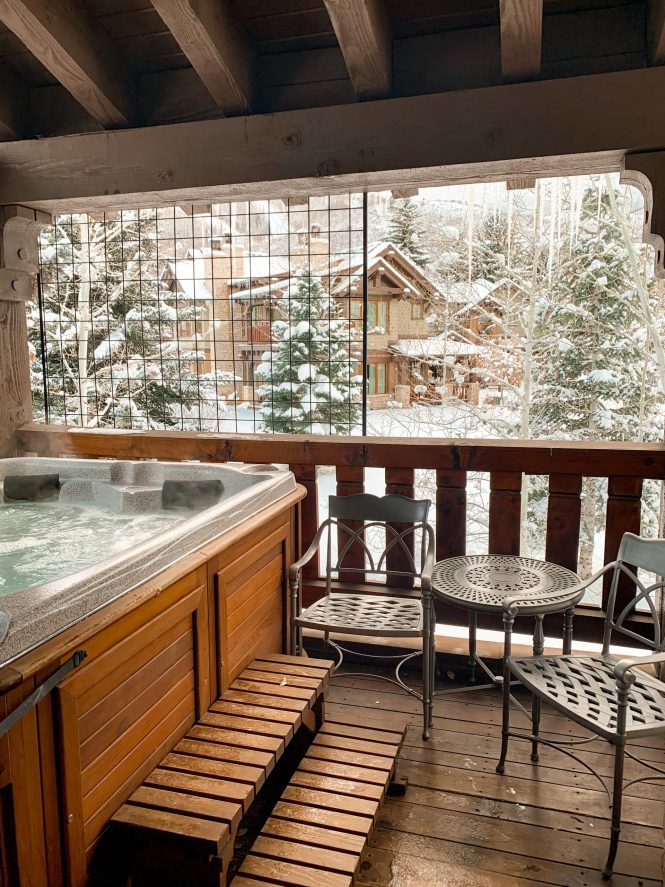 hot tub in ski villa in snow overlooking snowy background